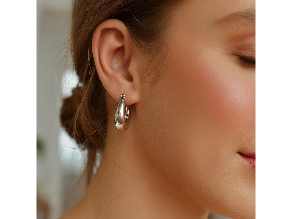 Puffed Graduated Silver Hoop Earrings