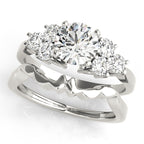 Round Cluster Peg Head Accent Engagement Ring