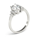 Oval Solitaire Cluster Side Engagement Ring