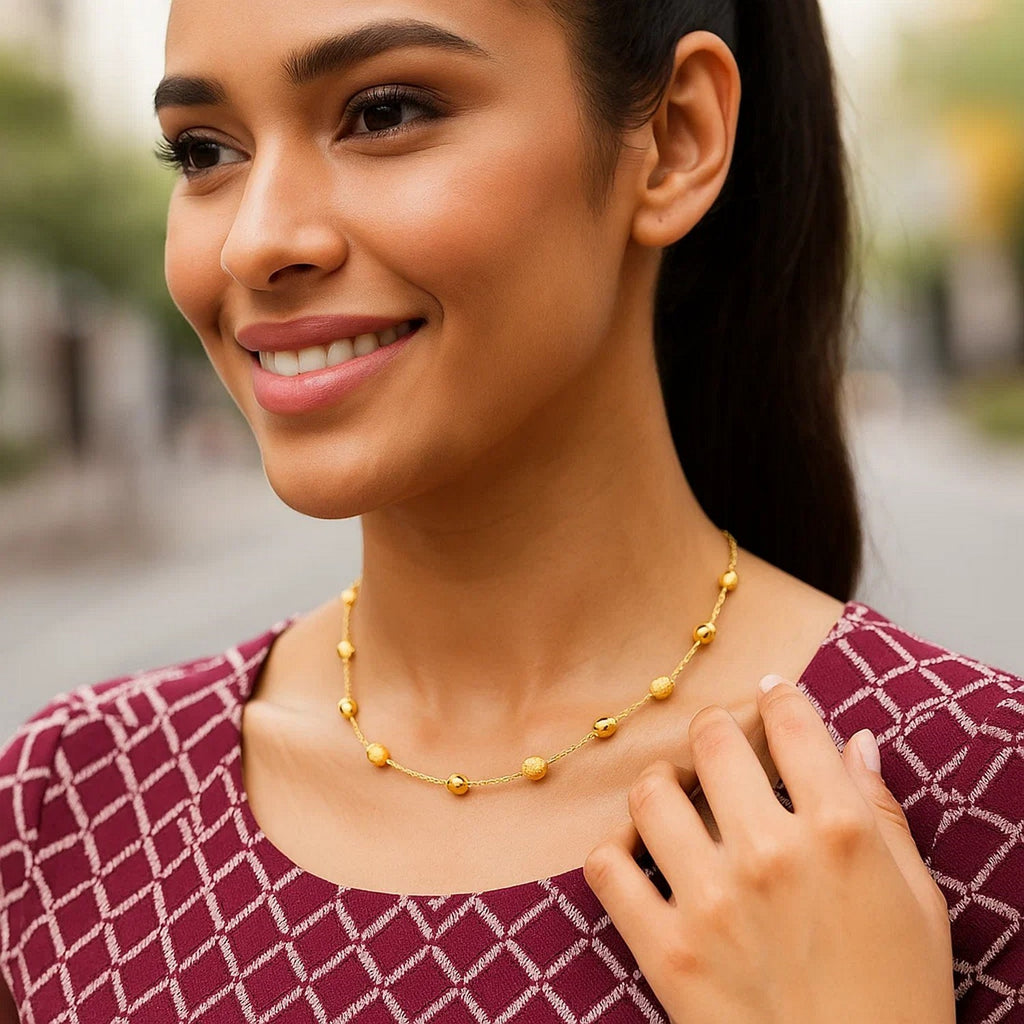 14k Yellow Gold Necklace with Polished and Textured Pebble Stations