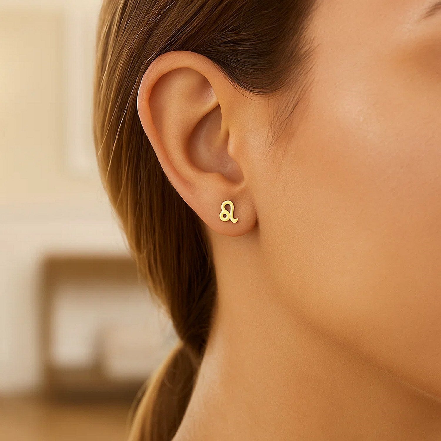 14k Yellow Gold Leo Stud Earrings