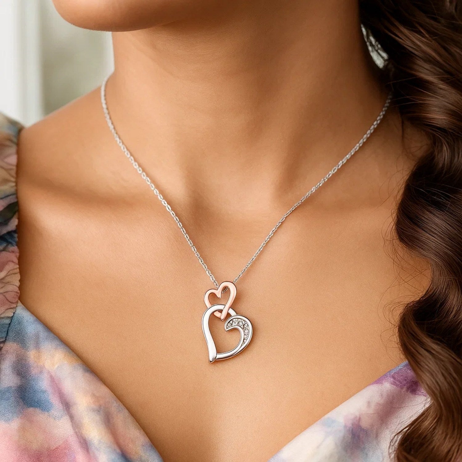 Sterling Silver Cascading Dual Heart Diamond Accented Pendant (.02 cttw)