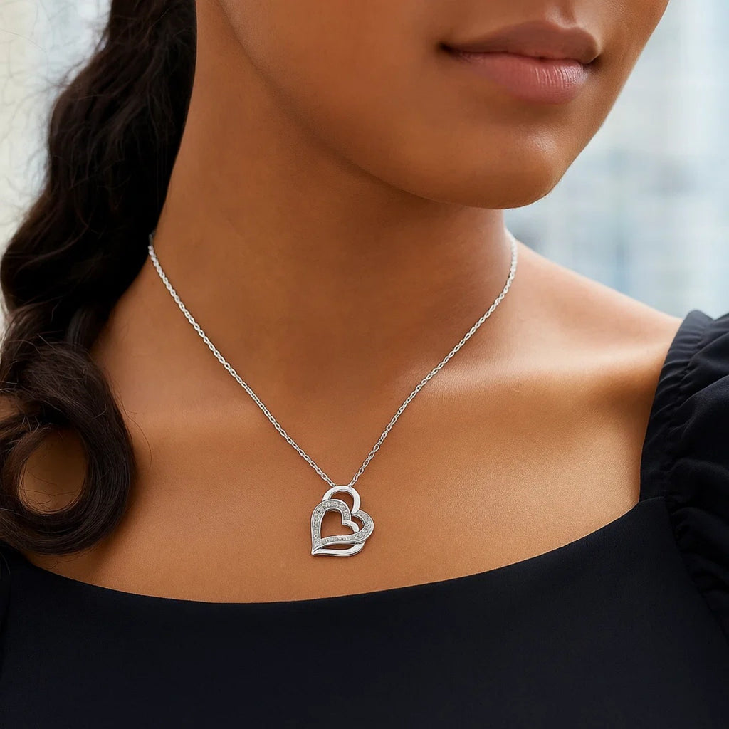 Sterling Silver Dual Heart Motif Pendant with Diamonds (.06 cttw)