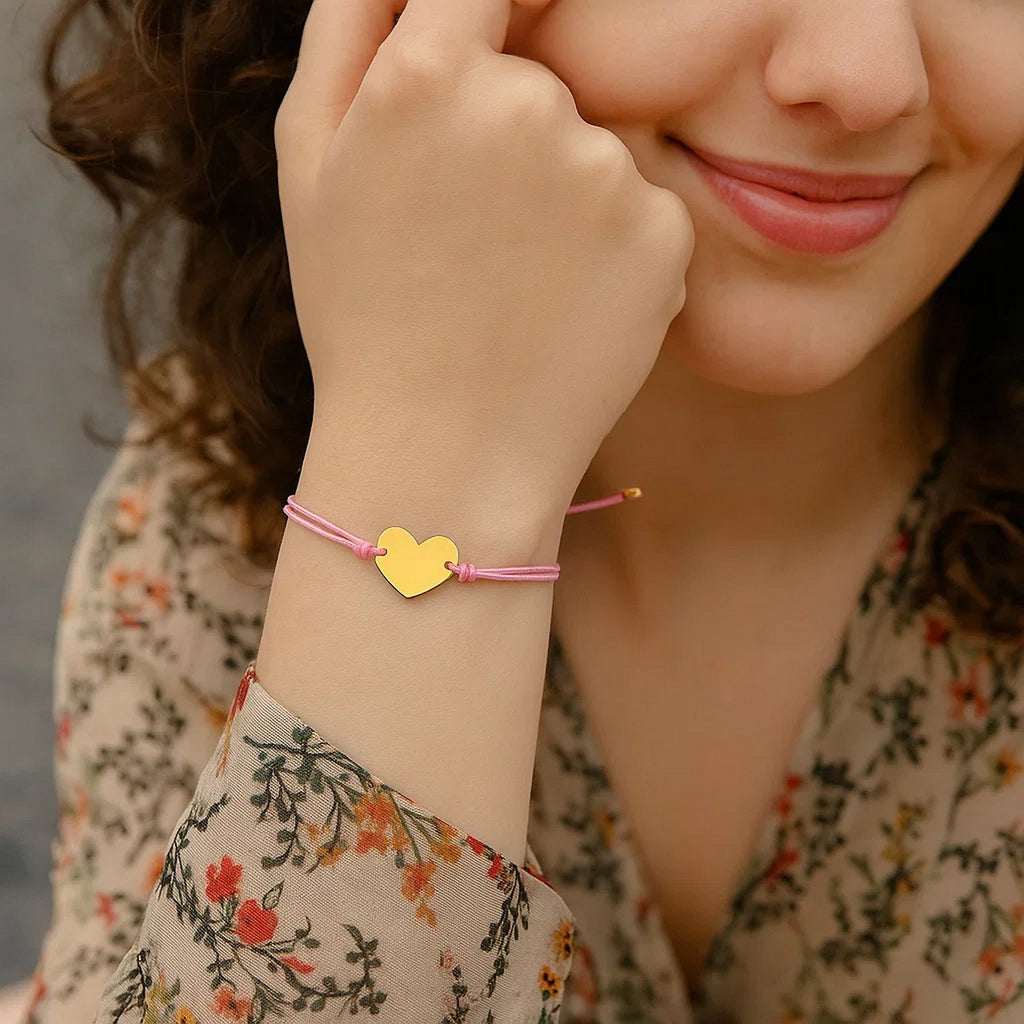 9 1/4 inch Pink Cord Adjustable Bracelet with 14k yellow Gold Heart