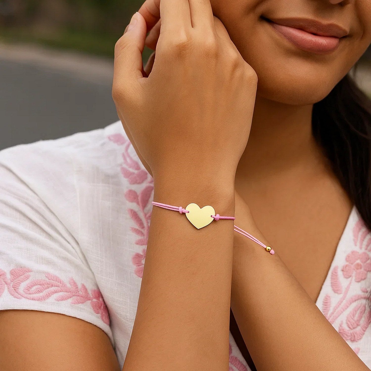 9 1/4 inch Pink Cord Adjustable Bracelet with 14k yellow Gold Heart