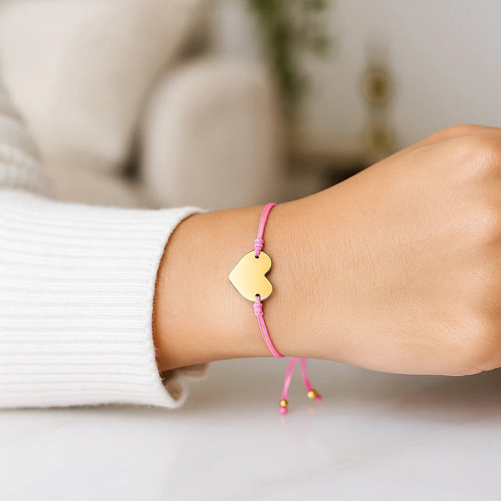 9 1/4 inch Pink Cord Adjustable Bracelet with 14k yellow Gold Heart