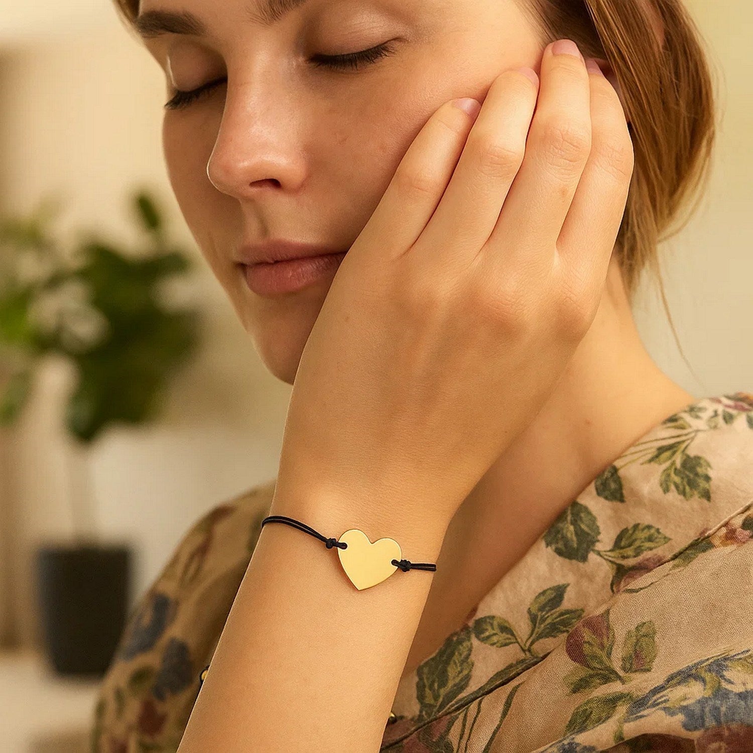 9 1/4 inch Black Cord Adjustable Bracelet with 14k yellow Gold Heart