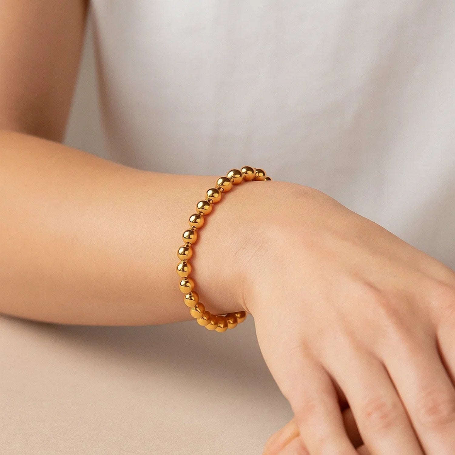 Polished 7mm Bead Bracelet in 14K Yellow Gold