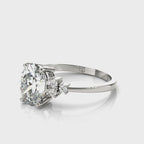 Oval Solitaire Cluster Side Engagement Ring