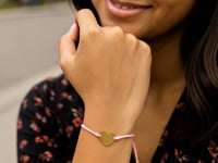 9 1/4 inch Pink Cord Adjustable Bracelet with 14k yellow Gold Heart