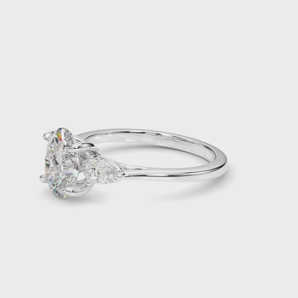 Three Stone Oval Diamond Engagement Ring with Pear Accents